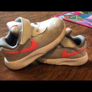 Grey and peach Nike sneakers